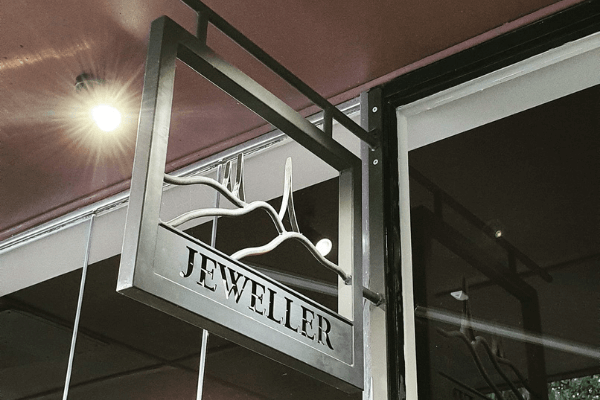 Jeweller shop sign with spotlight home automation